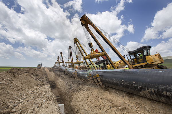 Transmission pipeline installation in a trench